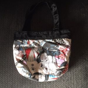 Distressed oriental printed mini handbag